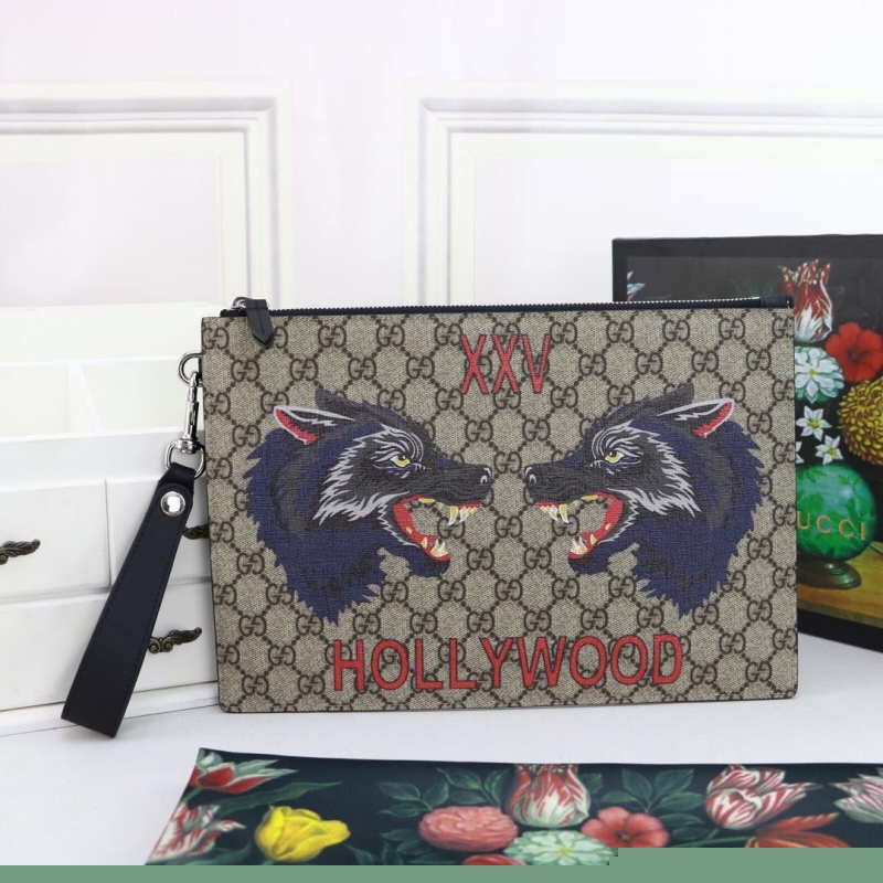 G*u*i clutch bags